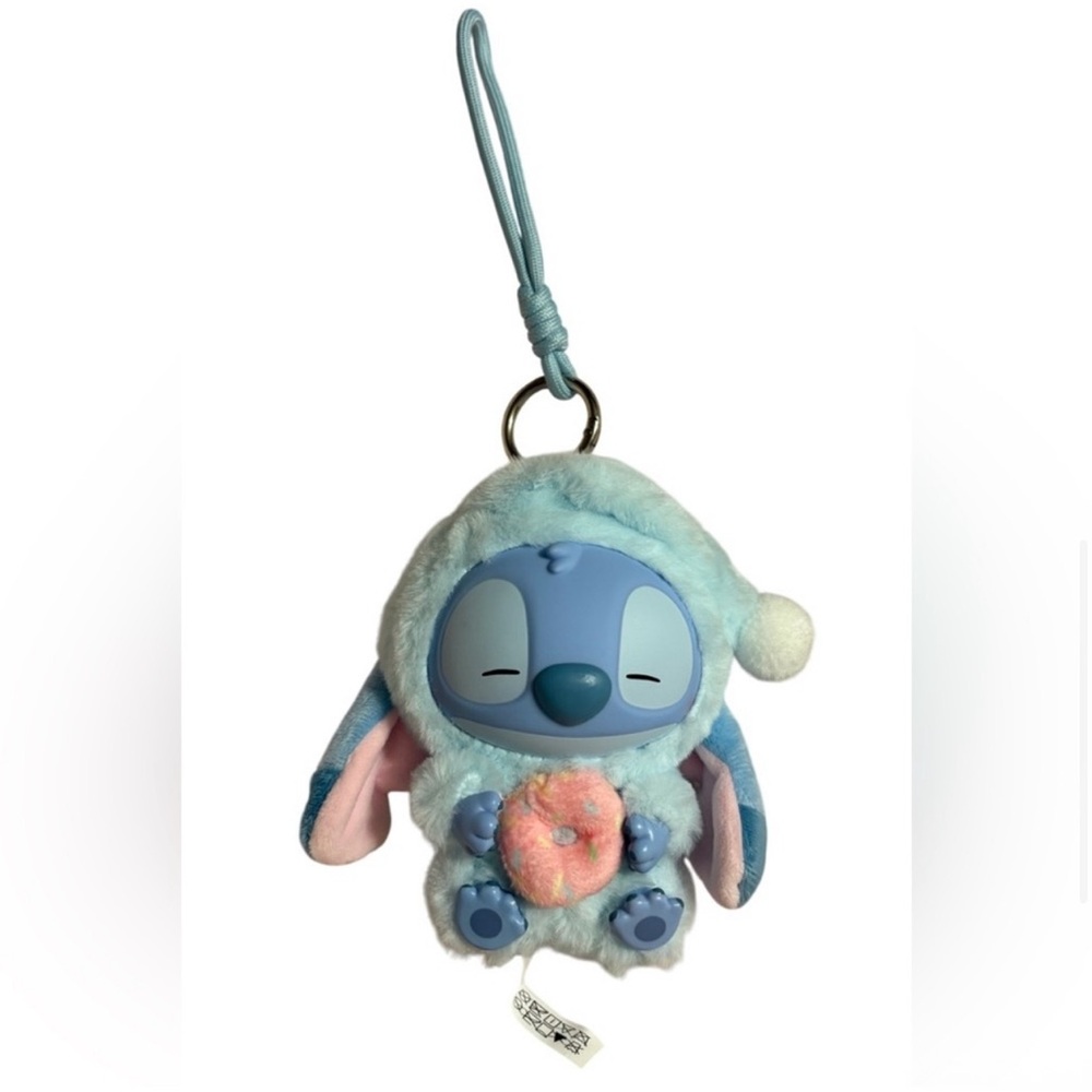 Disney MINISO Stitch Eat Something Before
Sleep Vinyl Plush KeychainSleepy Donut - Picture 6 of 9